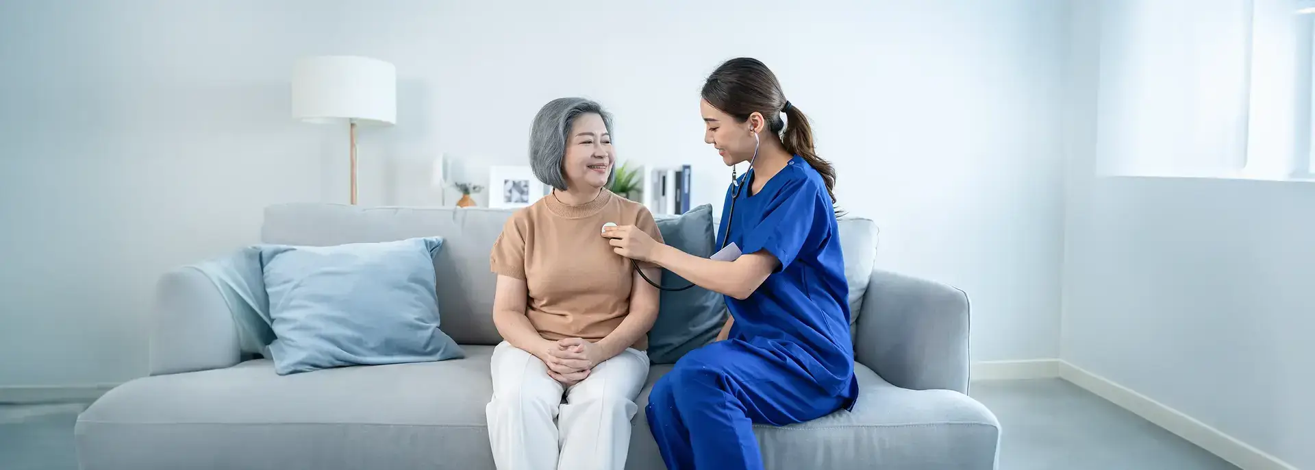 Doctor performs health screening to a patient banner